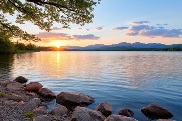 Peaceful lake sunrise landscape with reflections and tranquil atmosphere