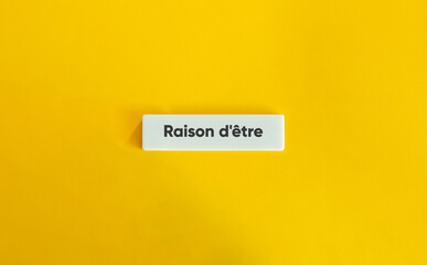 Raison d'être. Text on Block Letter Tile on Yellow Background. Minimal Aesthetic.