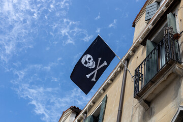 Pirate Flag Flying from Old Building
