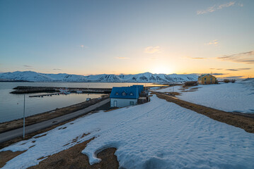 sunset view of the coast of village of Hrisey in north Iceland