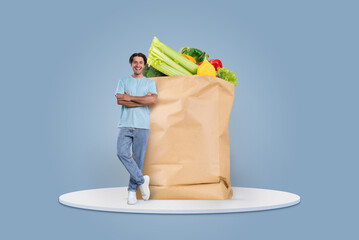 A customer stands confidently beside a large paper bag brimming with fresh vegetables and fruits....