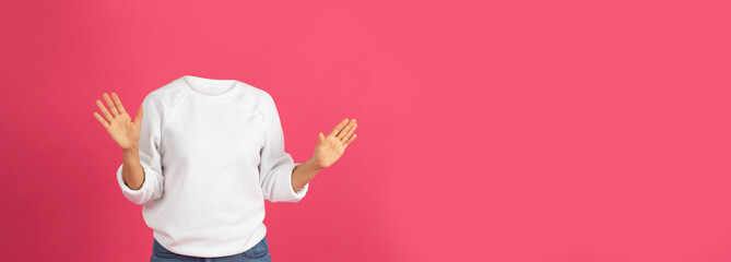 A person gestures enthusiastically without a visible head, showcasing a playful portrayal of...