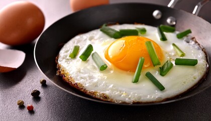 fried eggs with onion leaf