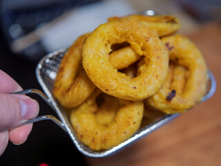 Crispy Golden Fried Onion Rings in a Basket
