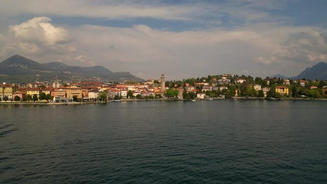 Aerial view of Lake Como, Italy. Beautiful lake surrounded by Alps mountains, charming towns, and green landscapes. Scenic nature and travel destination in Europe