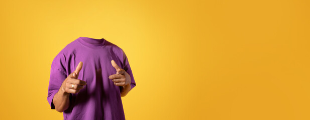 A headless person in a purple shirt striking a playful pose, showcasing body language in an...