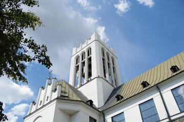 The Stunning Architectural Beauty of a Towering Structure Highlighted Against a Clear Blue Sky