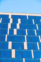 Modern Architectural Design featuring a stylish Blue Glass Facade that captivates viewers