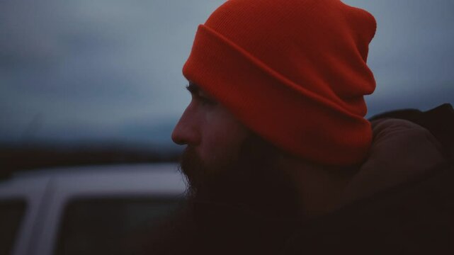 Man Experiencing Car Breakdown in Remote Icelandic Landscape
