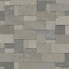Fototapeta premium A textured wall made of irregularly sized gray stone blocks