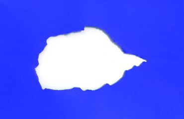 rip hole paper on white background with space
