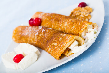 Bulgarian dish of pancakes palachinki with filling from brynza and walnuts