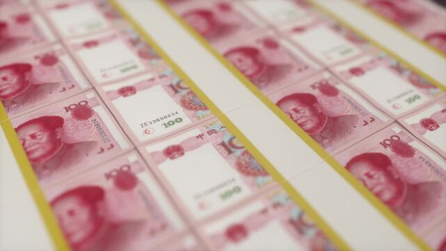 Loop Animation of Chinese Yuan Banknotes on Printing Conveyor