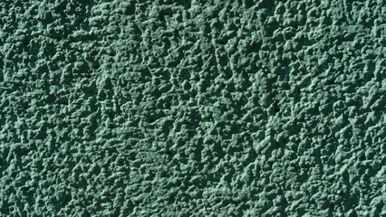 Detailed green stucco wall texture background, perfect for design, construction, or architectural isolated projects.