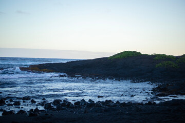 black sand beach at sunset
