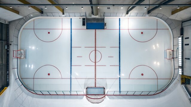 Aerial view of an empty indoor ice hockey rink - Powered by Adobe