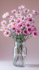 Obraz premium Delicate Pink Daisies in a Glass Jar A Beautiful Floral Arrangement