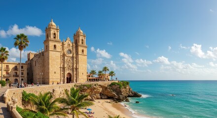 Historic church on rocky promontory overlooking sandy beach and azure sea