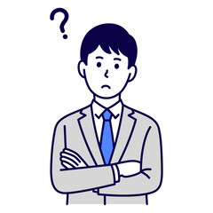 首をかしげて考えるスーツ姿の男性