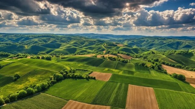 Overhead drone shot of vast rolling hills with patchwork farms under dramatic skies, high-definition texture and HDR color enhancement, wide panoramic feel