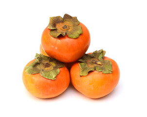 Stack persimmon fruits isolated on white background
