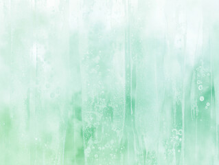 Soft green mist covering a glass surface with delicate water droplets reflecting light during early morning hours