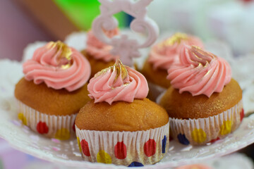 Decorated Birthday Cupcakes: Pink Frosting, Gold Detail, Celebration Treats