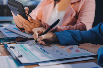 Business analyze,Close up Business people meeting to discuss the situation on the market. Business Financial Concept