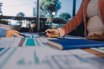 Naklejka premium Business analyze,Close up Business people meeting to discuss the situation on the market. Business Financial Concept