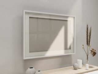 Large horizontal photo frames hanging on the wall. There don't seem to be any paintings or photographs inside, just reflective mirrors and shadows, especially the shadows of the reflected windows. Cre