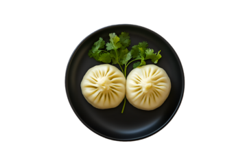 Steamed Buns on Black Plate Garnish with Cilantro