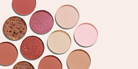 Banner with Cosmetics texture pattern, Warm vivid colored eye shadow makeup palette, round eye powder swatches. Female cosmetic, beauty products, aesthetic beauty photo, colorful eyeshade, top view