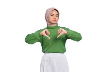 Beautiful annoyed Asian woman in a green sweater showing thumbs down isolated on transparent background