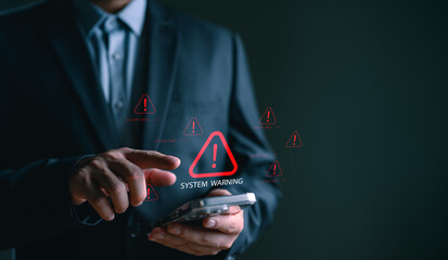 System warning alert on smartphone screen, showing hacking threat and cybersecurity risk,...