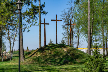 Three crosses placed on a small hill in the cemetery, symbolizing Golgotha. A place of reflection...