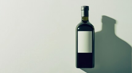 Wine bottle with blank label under studio light