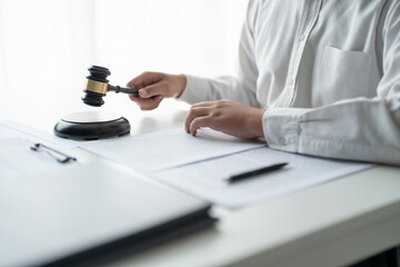 Lawyer businessman working with lawbook in office or courtroom Legal counsel with gavel and legal...
