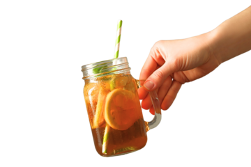 Hand holding a mason jar of iced tea with lemon slices and a straw, isolated on white, PNG