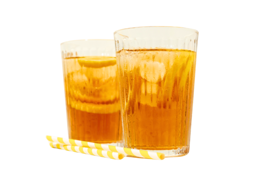 Two tall glasses of iced tea filled with ice and lemon slices, isolated on white, PNG