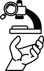 hand is holding a microscope