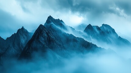 Obraz premium Misty Mountain Landscape with Rolling Clouds and Dramatic Background