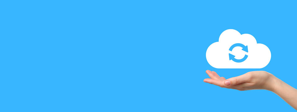 Hand presents a cloud icon symbolizing data synchronization and storage solutions