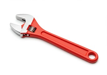 A red adjustable wrench with a silver head lying on a white surface in a studio setting tool shot