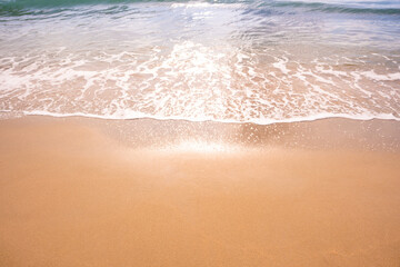 Nature of the beach and sea Summer with sunshine, sandy beaches, clear blue waters sparkling against the blue sky. On an island with good ecology and environment Background for summer vacation