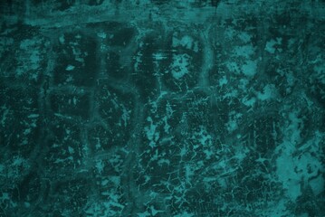 cracked wall background with light green rays, The background is a combination of dark green and black on the side there is a dark vignette