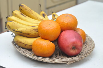 bananas oranges and apples served