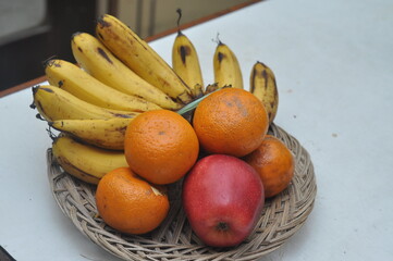 bananas oranges and apples served