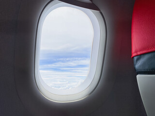travel and transportation concept with see city and beautiful sky from airplane window