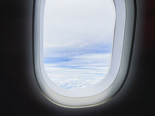 travel and transportation concept with see city and beautiful sky from airplane window