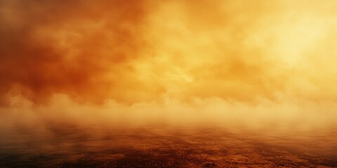 A early morning sky with a hazy orange glow and fog rising from the ground